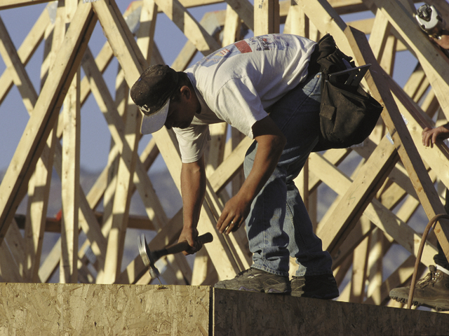 Framers working on roof from Wolfe Lumber and Supply, Ponchatoula, LA